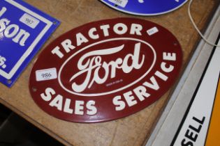 A reproduction Ford Tractor sign