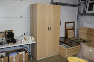 A modern laminate IKEA two door wardrobe