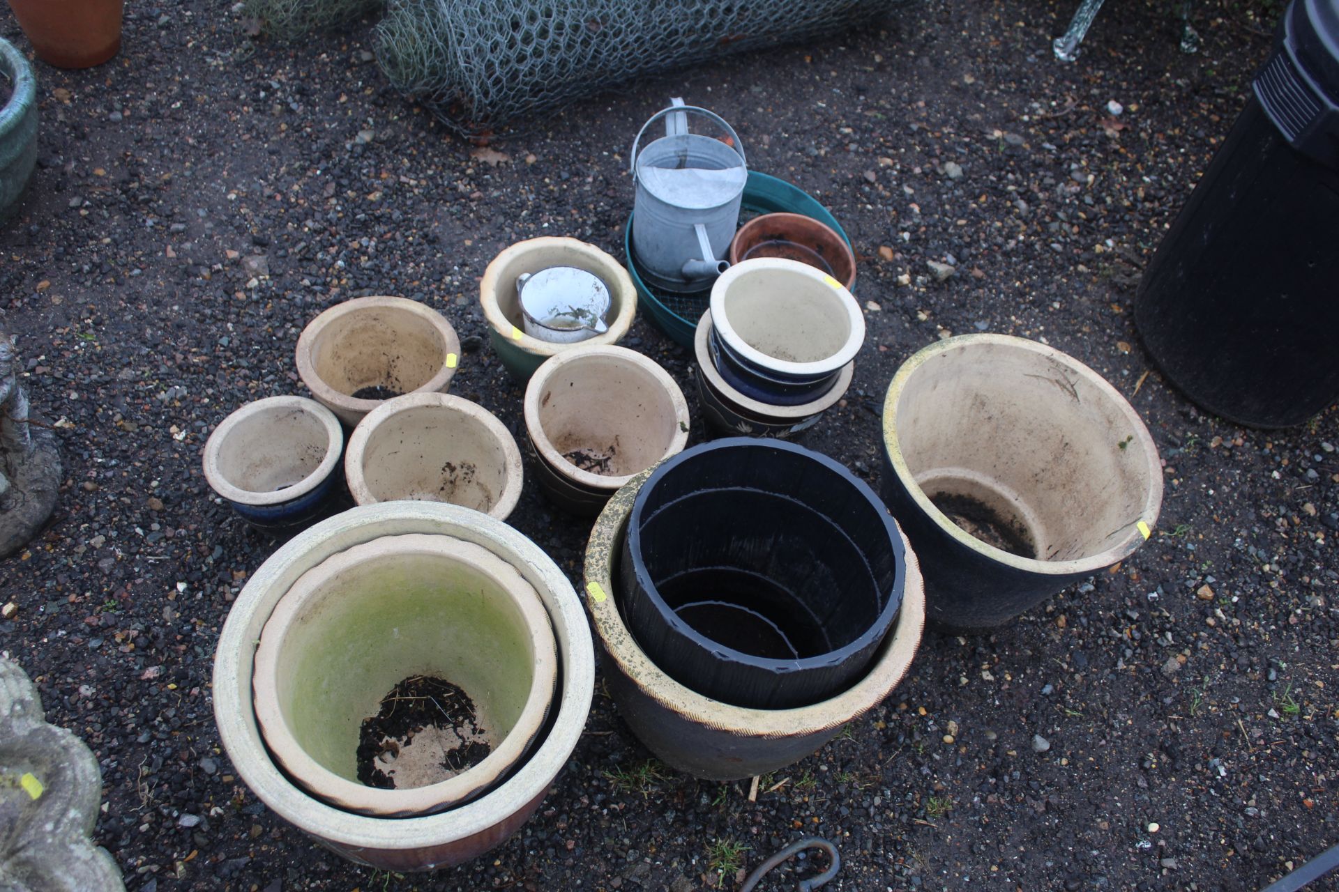 A large quantity of various planters, a galvanised