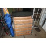 Two metal framed garden loungers with cushions and