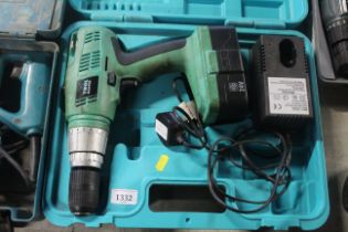 A Toolmaster TM16 cordless electric drill with bat