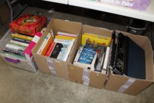 Four boxes of miscellaneous books, games etc.