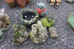 A set of concrete garden ornaments to include owl