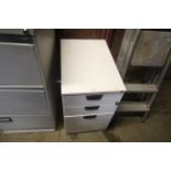 A Kinnarps metal three drawer filing cabinet with