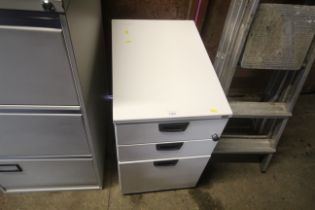 A Kinnarps metal three drawer filing cabinet with