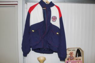 A Raleigh car coat with Austin Healey badge