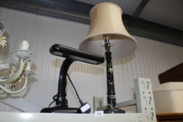 A table lamp and shade and an adjustable desk lamp