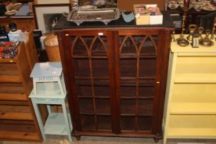 A 19th Century mahogany cabinet, the interior fitt