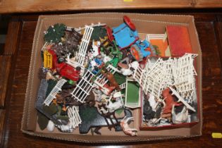 A box of various Corgi and Britains plastic farm a