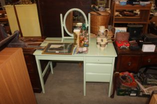 A green painted kneehole dressing table and swing