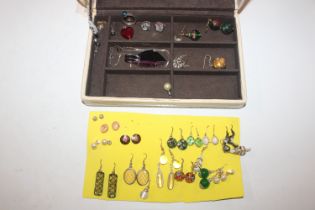 A box of Murano and foil glass silver mounted jewe