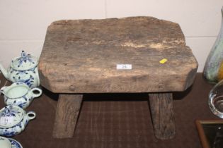 An antique oak stool