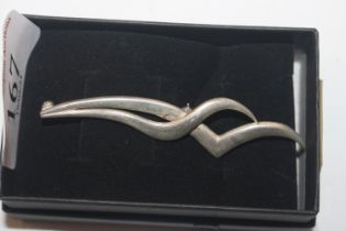 A modernist Sterling silver brooch