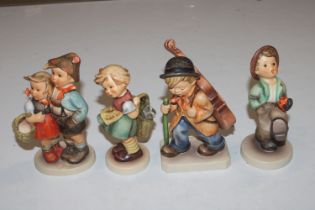 Four Hummel Goebel figures "Little Cellist", "Happ