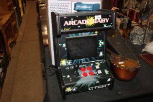 A boxed retro style arcade game with 99 games buil