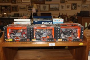 Six Harley Davidson boxed scale models