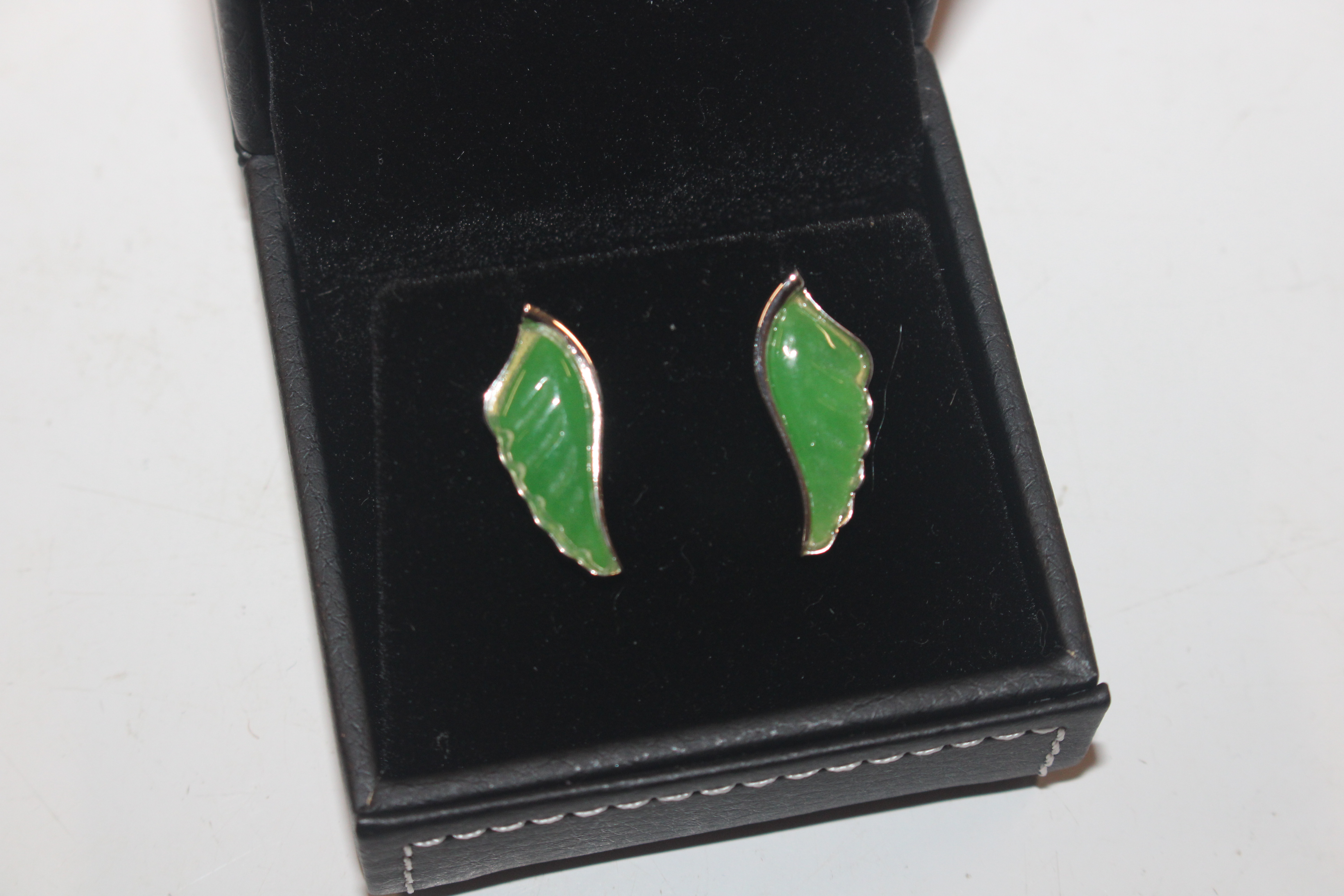 A pair of 925 silver and green amber ear-rings