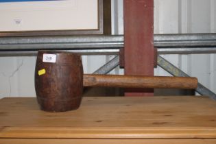 A large wooden mallet