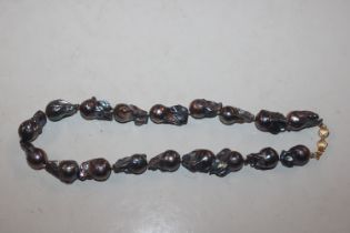 A large blister pearl necklace