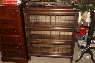 A Globe Werneck bookcase of three sections with le