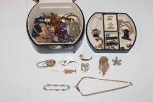 A jewellery box and contents of costume jewellery