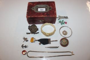 A jewellery box and contents of various jewellery