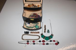 A cantilever jewellery box and contents of various