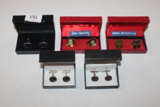 Five pairs of boxed cuff-links