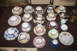 A quantity of 19th Century and later cups and saucers to include Cauldon, Crown Staffordshire,