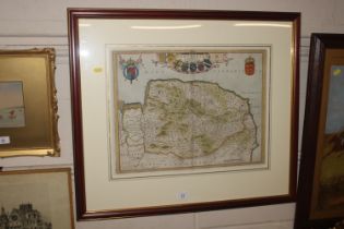 A framed and glazed coloured map of Norfolk