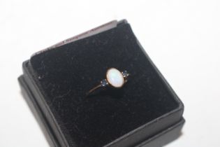 A 9ct gold opal set ring, ring size N/O, approx. t