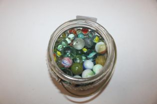 A glass jar of marbles