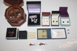 A box containing 9ct gold and other ear-rings and