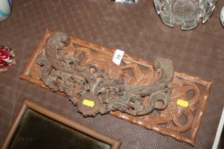 Two Oriental wood carvings