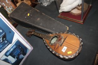 A cased Neapolitan mandolin by Fratelli Frati in fitted case