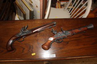 A pair of decorative flint lock pistol's AF