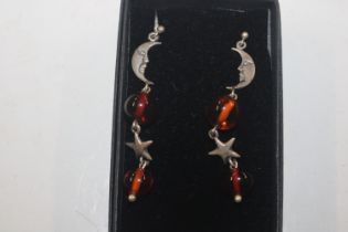 A pair of 925 silver and amber ear-rings