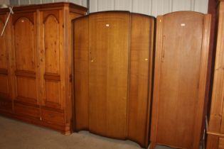 An oak single wardrobe