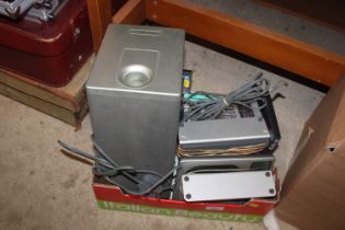 A CD player and various DVD's and CD's