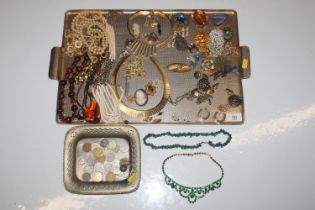 A tray and contents of various decorative costume