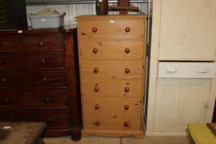 A modern pine chest fitted six long drawers