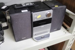 A Philips micro stereo system with remote control