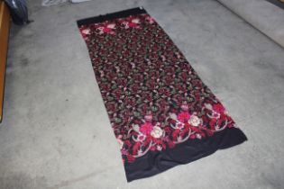 An approx. 220cm x 90cm embroidered scarf