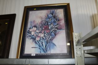 A gilt framed floral print
