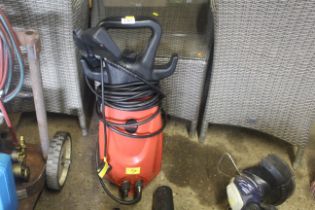 A Powerbase Xtreme pressure washer with lance