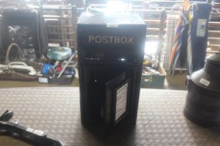 A black painted wall mounting post box (200mm deep