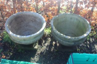 A pair of large planters