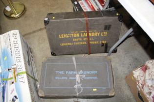 Two cardboard laundry boxes named to Leighton Laun