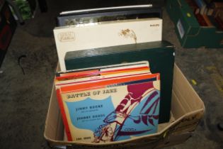 A box of records including jazz LPs, boxed set of