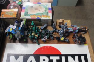 A quantity of various toys to include Transformers